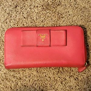 100% authentic pre-loved Prada safiano wallet ribbon Pink In good used condition